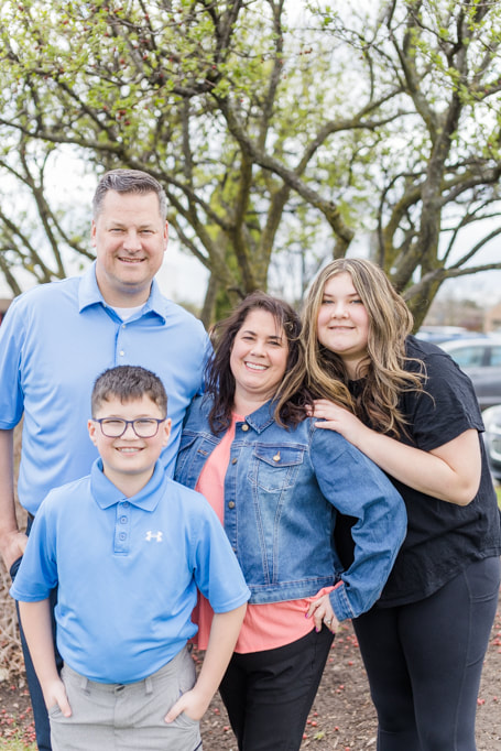 family of four with a blue color scheme